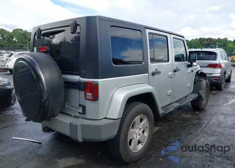 2010 Jeep Wrangler Unlimited Sahara from USA, damaged, VIN 1J4BA5H16AL167487